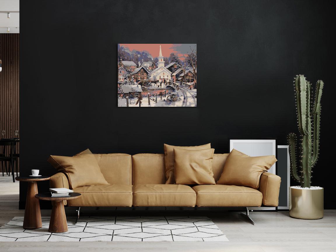a living room with a couch and a painting on the wall